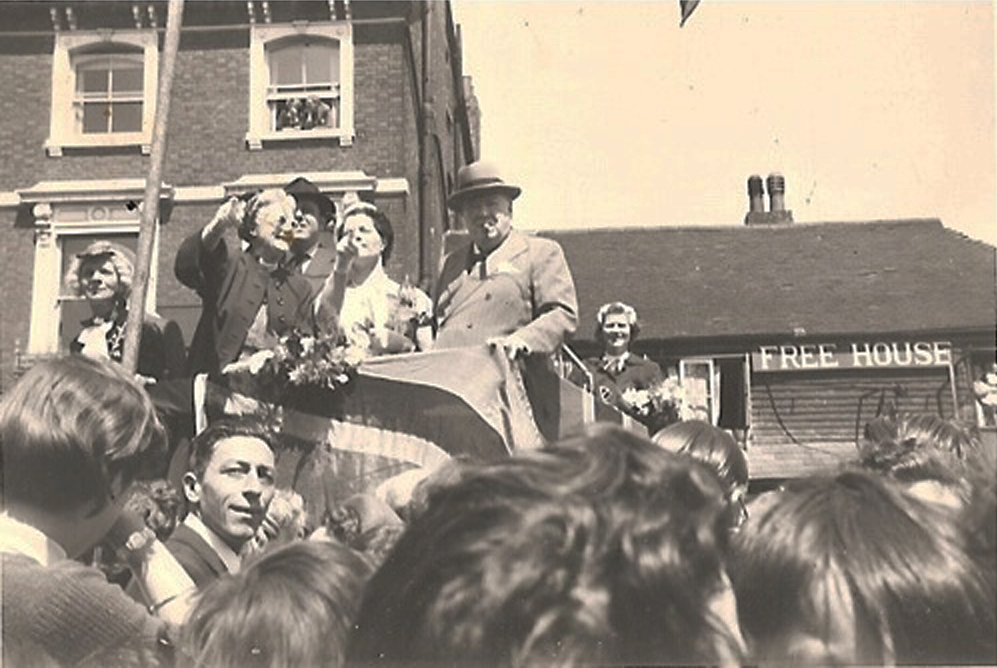 Unidentified woman - Lady CHURCHILL - CHRISTOPHER SOAMES - HELEN LONG (née Vlasto) - Sir WINSTON CHURCHILL - MARY SOAMES Westerham Carnival (early 1950s).jpg